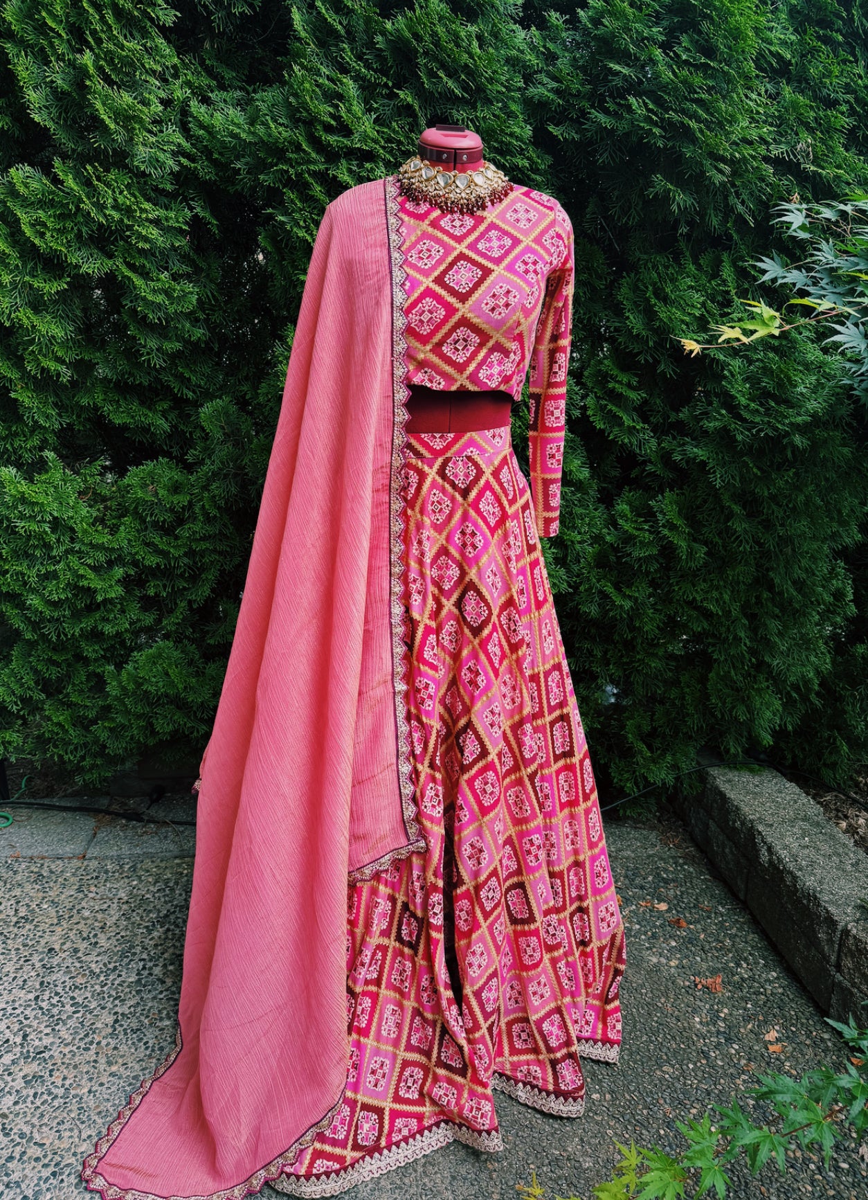 Pink Hexagonal Skirt with Monochrome Blouse